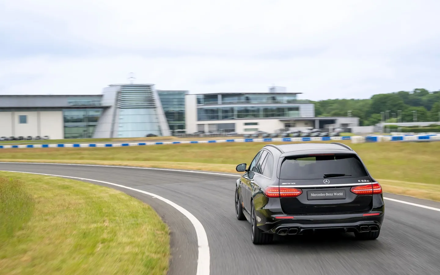 A learner driver in a dual-controlled Mercedes-Benz on a training circuit at Mercedes-Benz World during a weekday session.