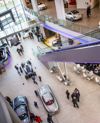 Chef preparing gourmet dishes in the kitchen at Mercedes-Benz World, emphasizing fresh, high-quality ingredients and culinary expertise.