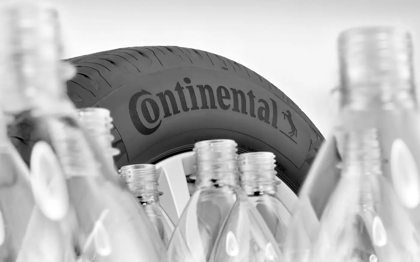 Continental ContiRe.Tex tyre featuring sustainable technology, with close-up view highlighting eco-conscious materials and advanced tread design.
