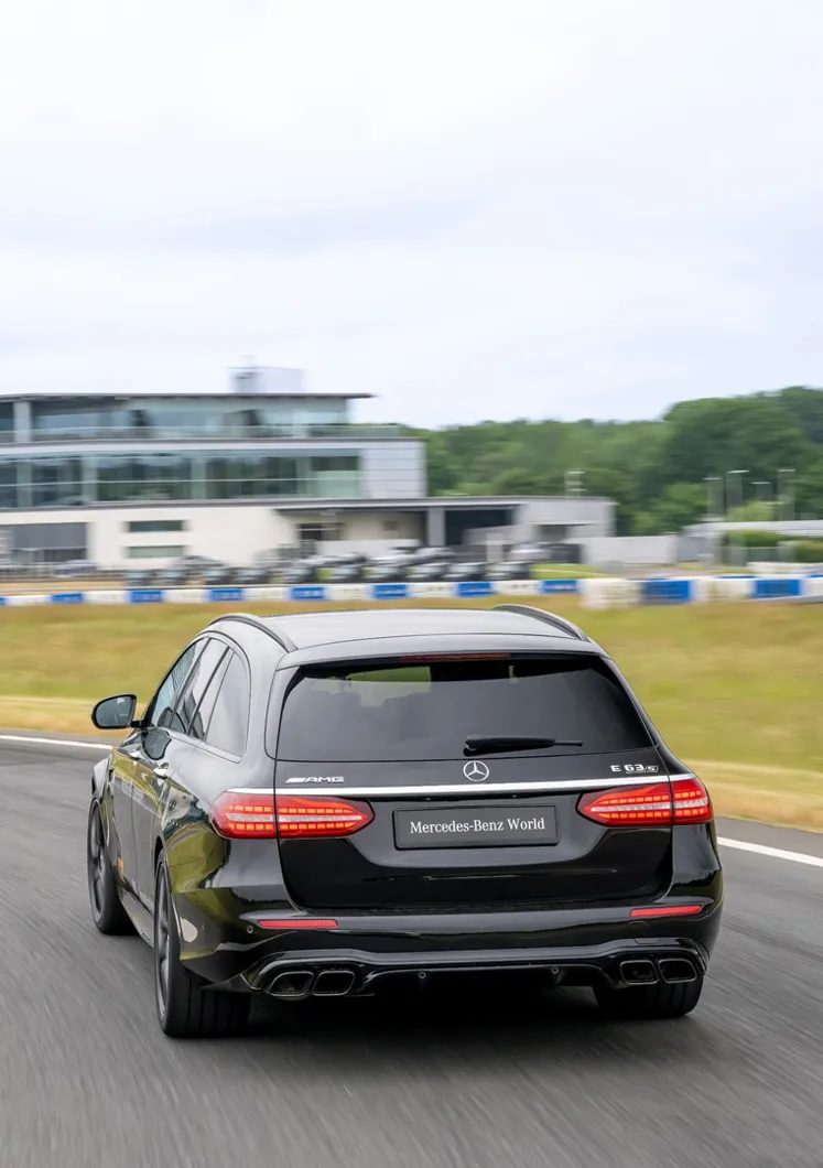 Mercedes-AMG 63 series cars lined up for a Half Day Experience at Mercedes-Benz World, ready for high-performance driving sessions.